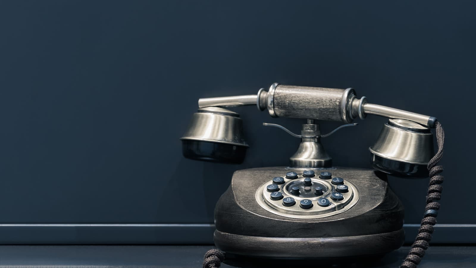 A person dialing on a smartphone